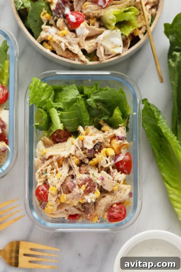 Rotisserie Chicken Cobb salad portioned into a meal prep container