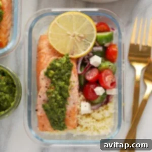 Mediterranean salmon meal prep in glass container