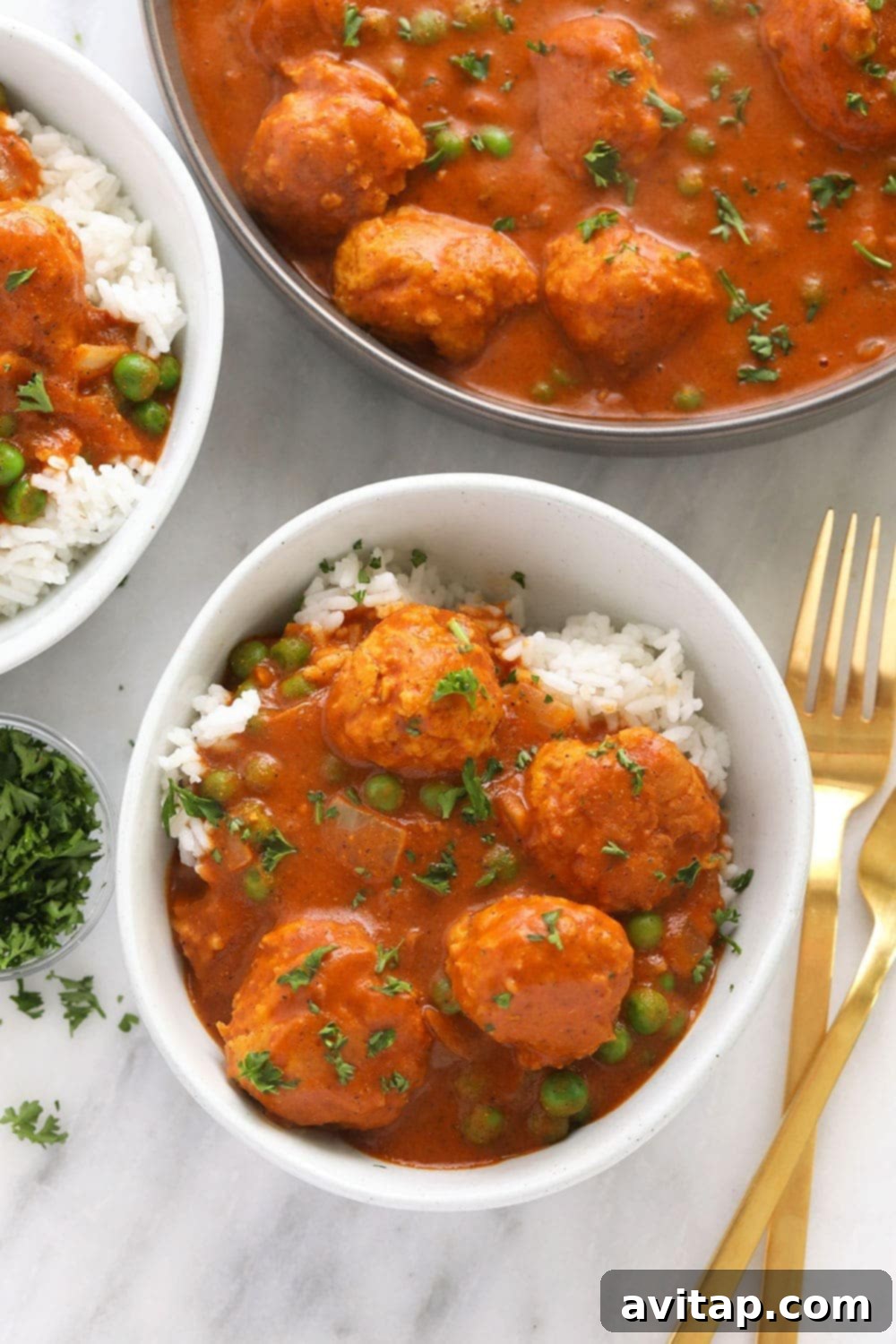 Hello, tikka masala meatballs! Enjoy a bowl of these tikka masala meatballs over a bed of rice, quinoa, or roasted veggies! You can make it for dinner or for a great meal prep dinner for the week! Tikka Meatballs in a bowl!