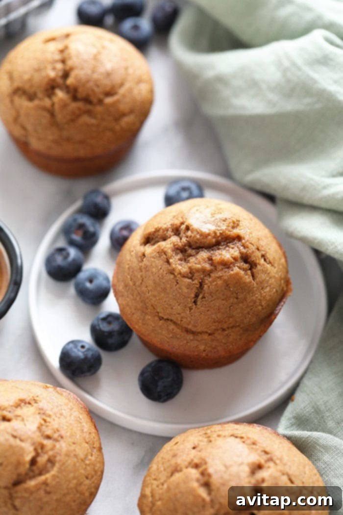 Delicious Almond Butter Banana Bread Muffins on a cooling rack, ready to be enjoyed.