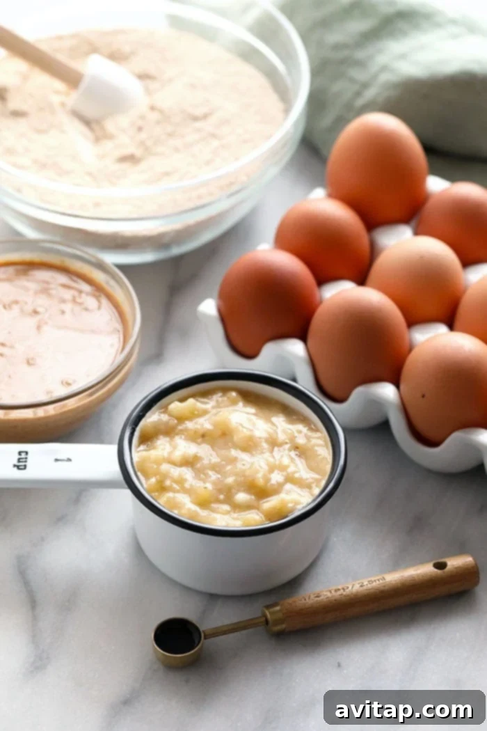 Close-up of healthy banana bread muffin ingredients laid out, highlighting their freshness and quality.