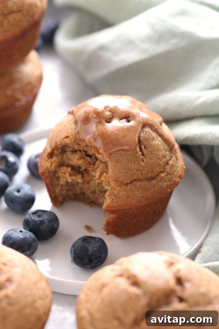Another perspective of fluffy banana bread muffins, showcasing their inviting texture.
