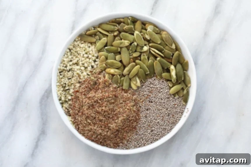 An elegant plate showcasing a variety of seeds like chia, flax, and hemp, highlighting their nutritional benefits.
