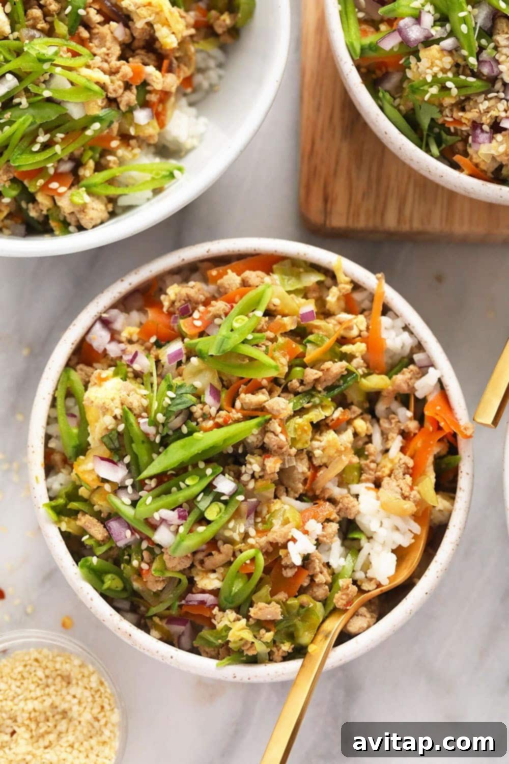 egg roll in a bowl served with rice