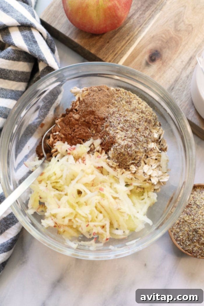 Gather Your Ingredients for the Perfect Apple Cinnamon Overnight Oats All ingredients for apple cinnamon overnight oats neatly arranged in bowls.