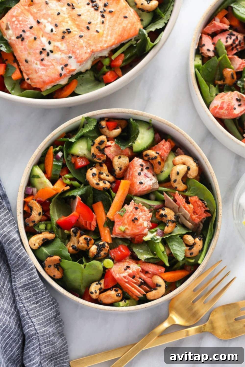 Vibrant Thai Salmon Salad with fresh ingredients and maple sesame cashews