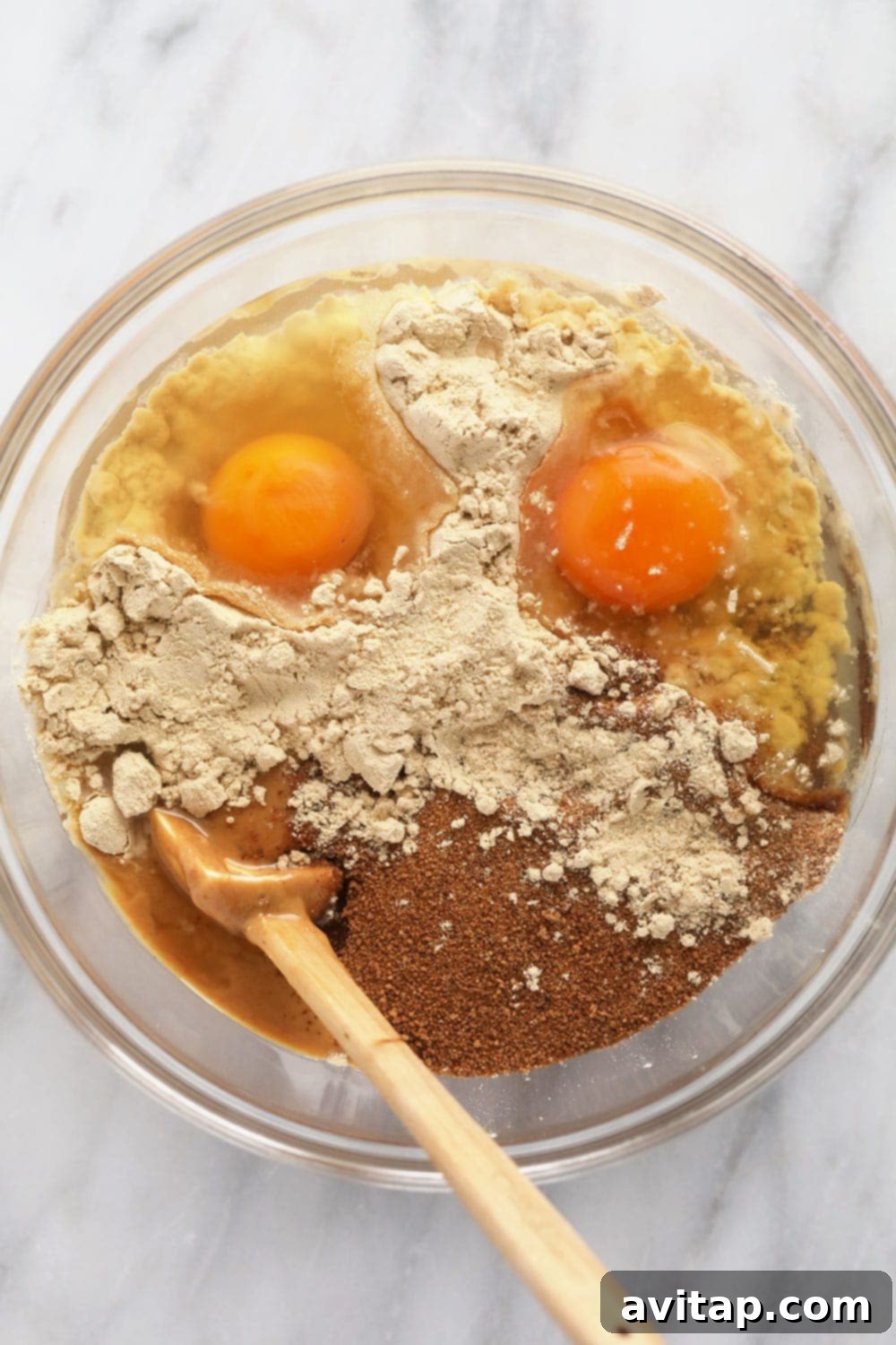 Bowl filled with the simple, wholesome ingredients for protein cookies