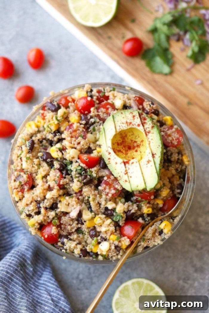 The Secret to Fluffy Quinoa 3 A colorful and fresh Mexican Quinoa Salad in a serving bowl, perfect for a healthy meal.