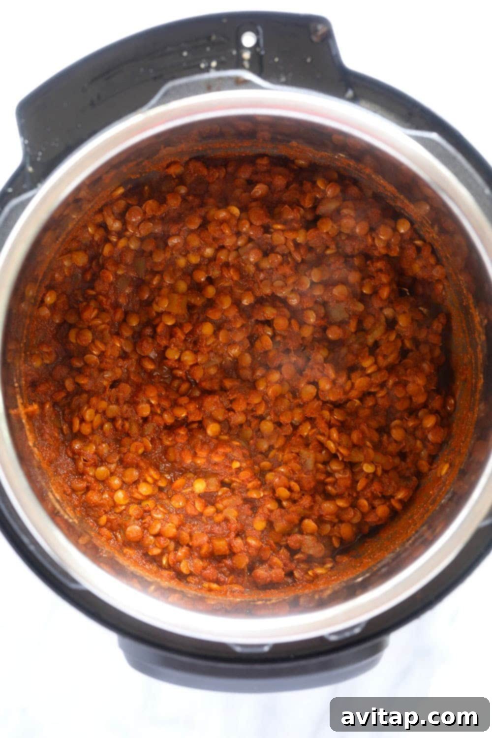 Close-up of cooked Instant Pot Lentil Tacos filling inside the Instant Pot, perfectly seasoned.