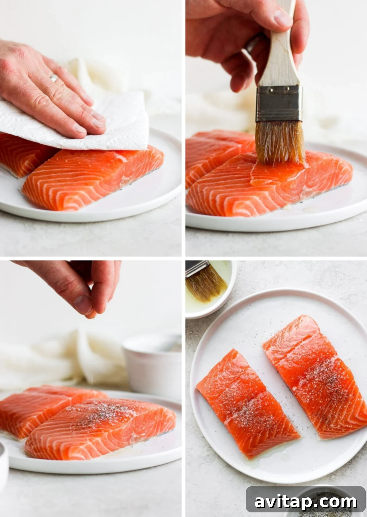 Raw salmon fillets on a plate being seasoned with coarse salt and black pepper, and brushed with a generous amount of olive oil before grilling.