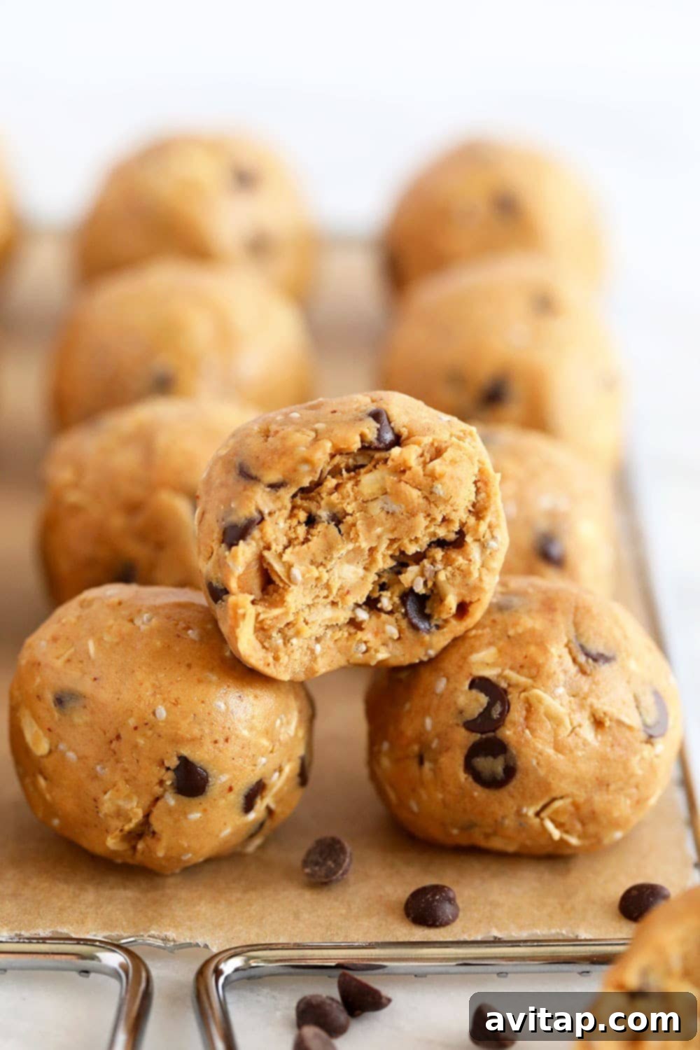 A beautiful stack of peanut butter protein balls, emphasizing their healthy appeal and convenience.