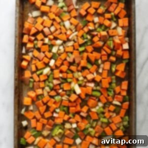 raw veggies on baking sheet.