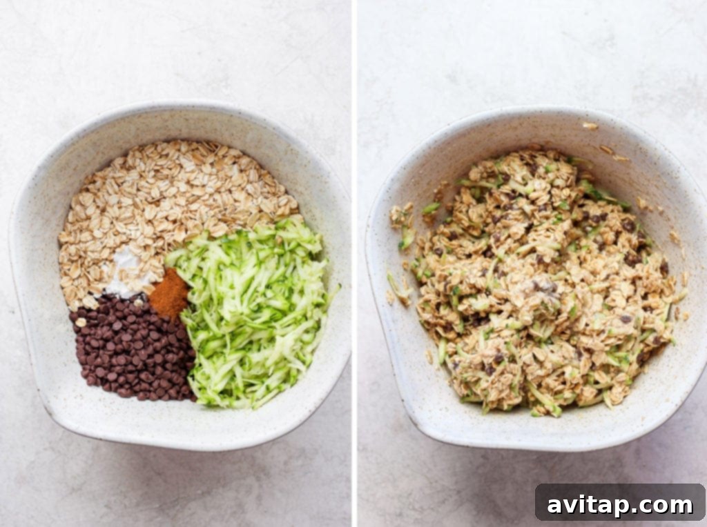 All the dry and wet ingredients for zucchini oatmeal cups are gathered in a large mixing bowl, ready to be combined.