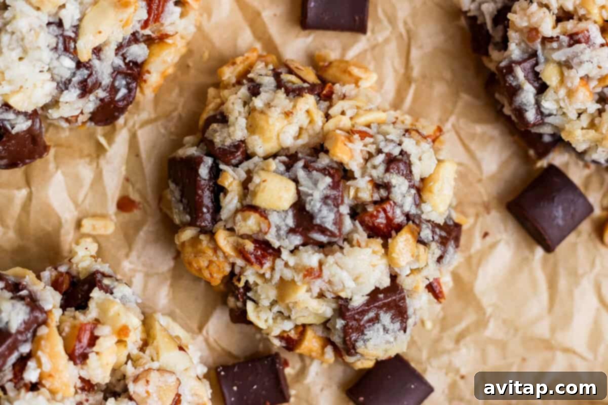 Close-up of delicious magic cookies with nuts, oats, and chocolate chunks