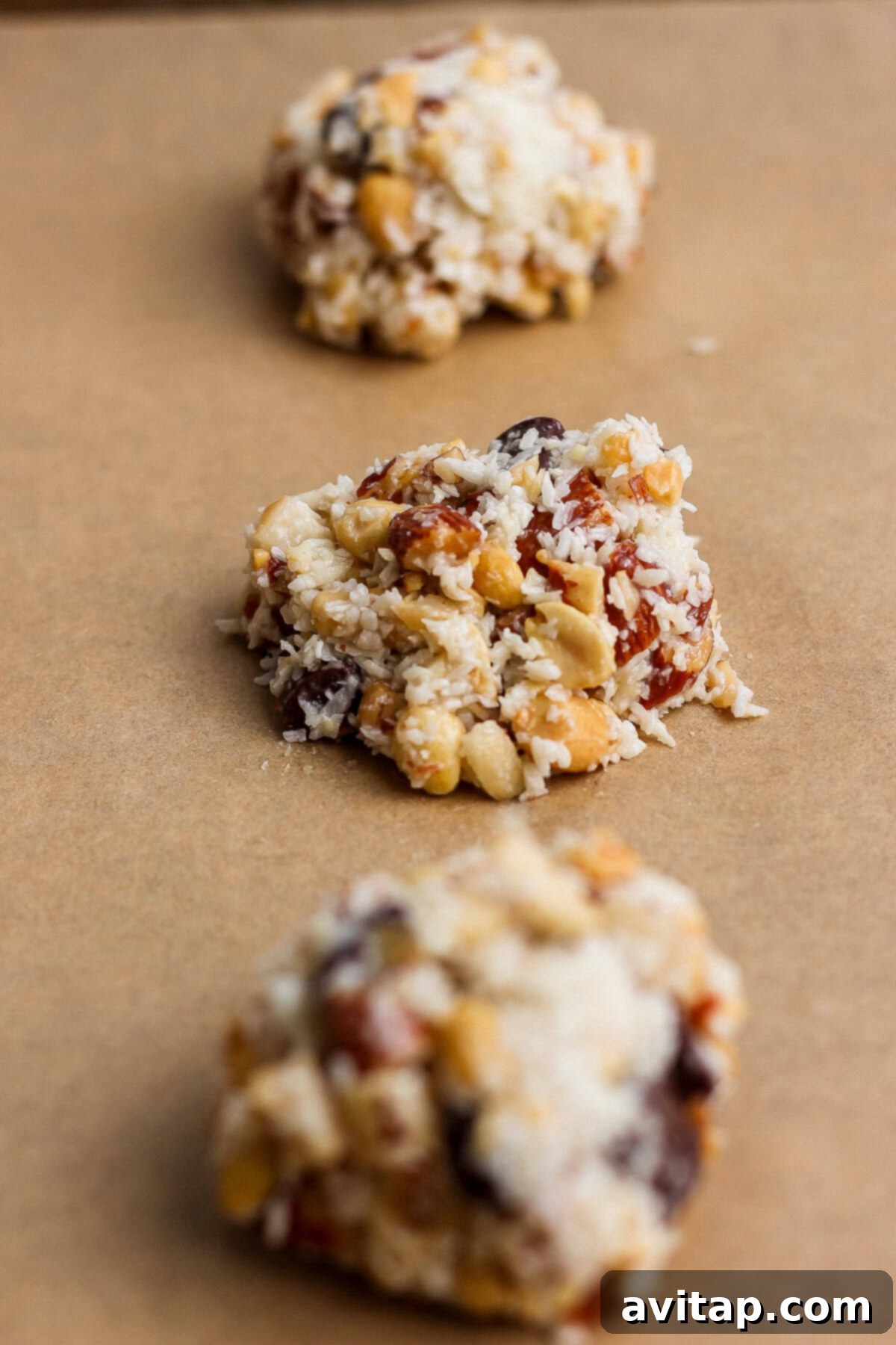 Unbaked cookie dough on parchment paper