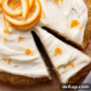 Round cake with white frosting.