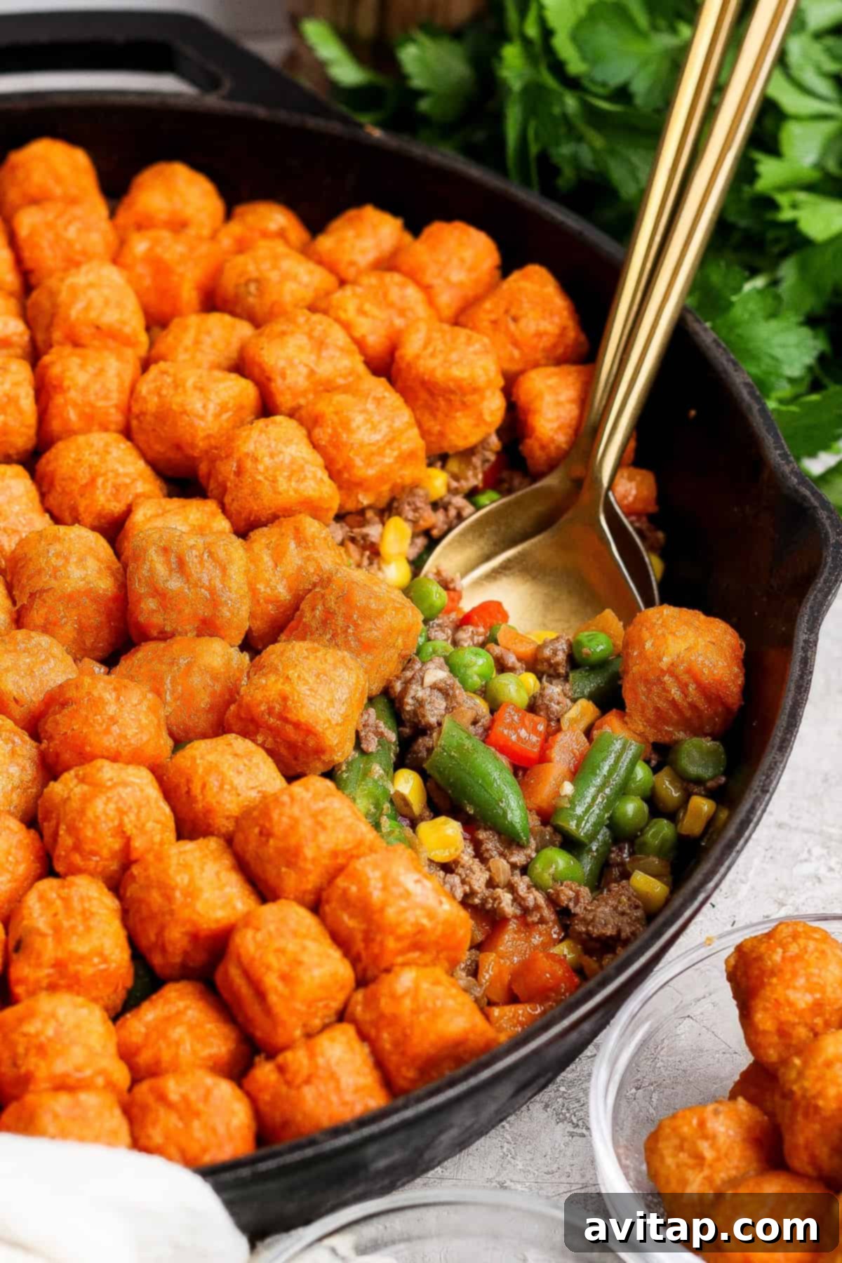 Sweet Potato Tater Tot Casserole served from a skillet