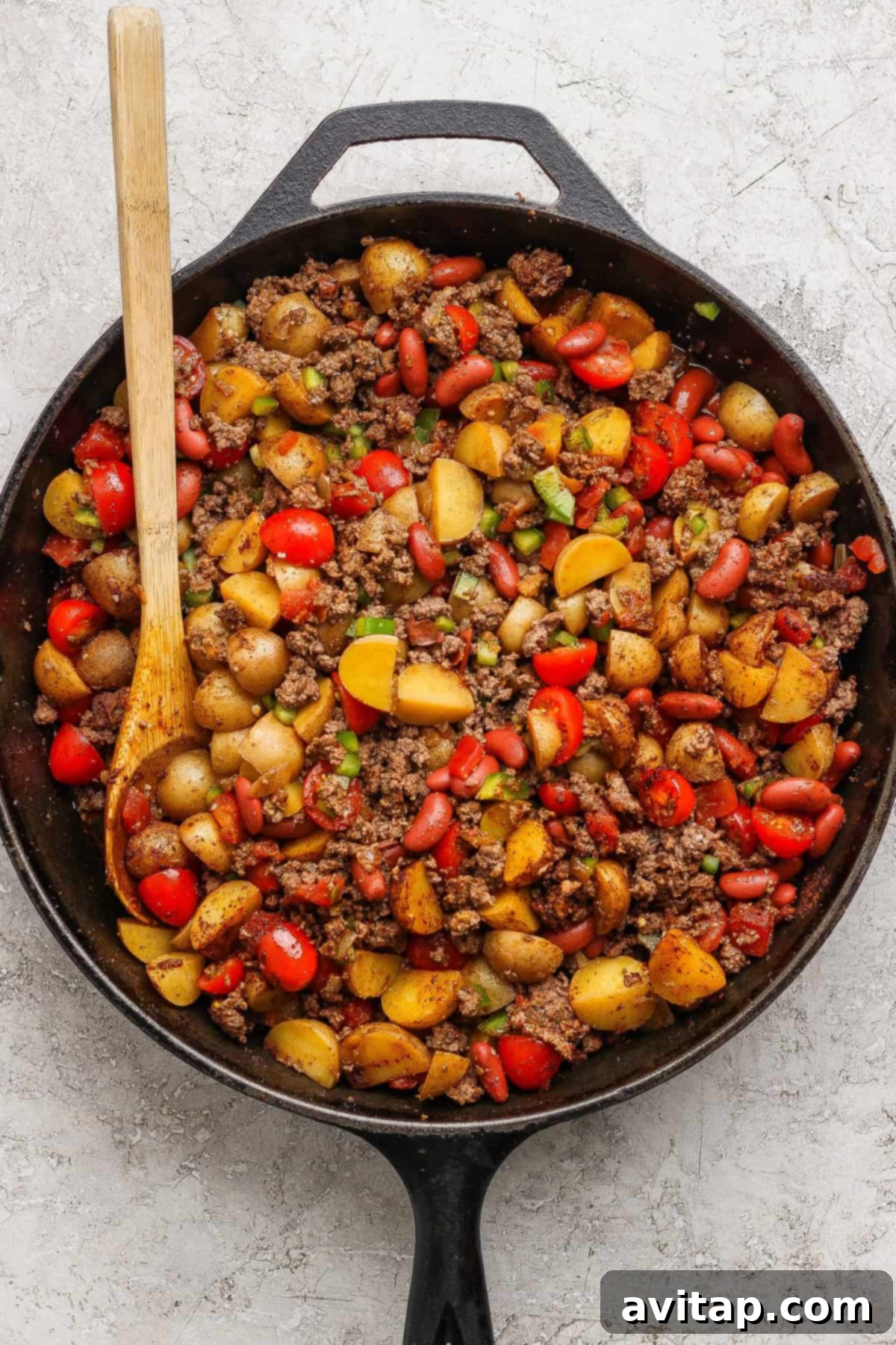 Cooked potato chili skillet in a cast iron pan.