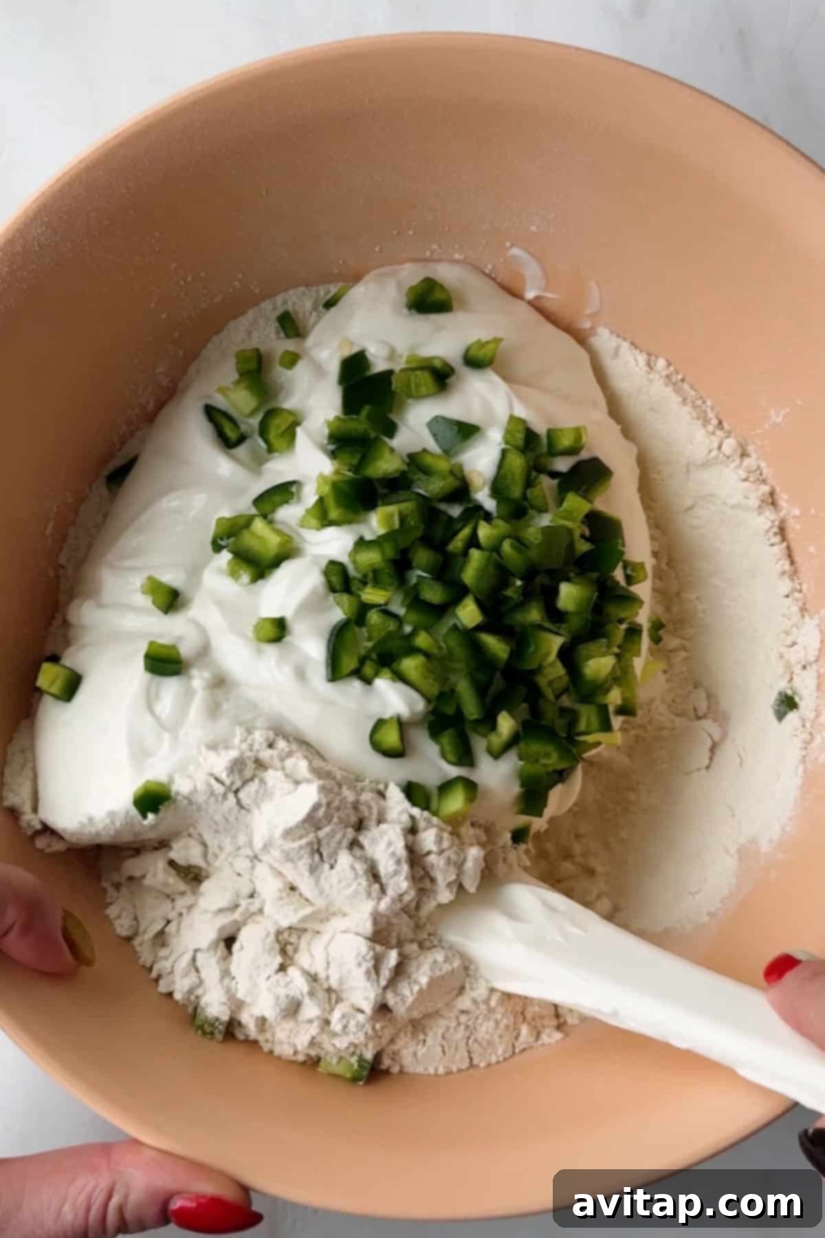 Mixing dough ingredients in a bowl