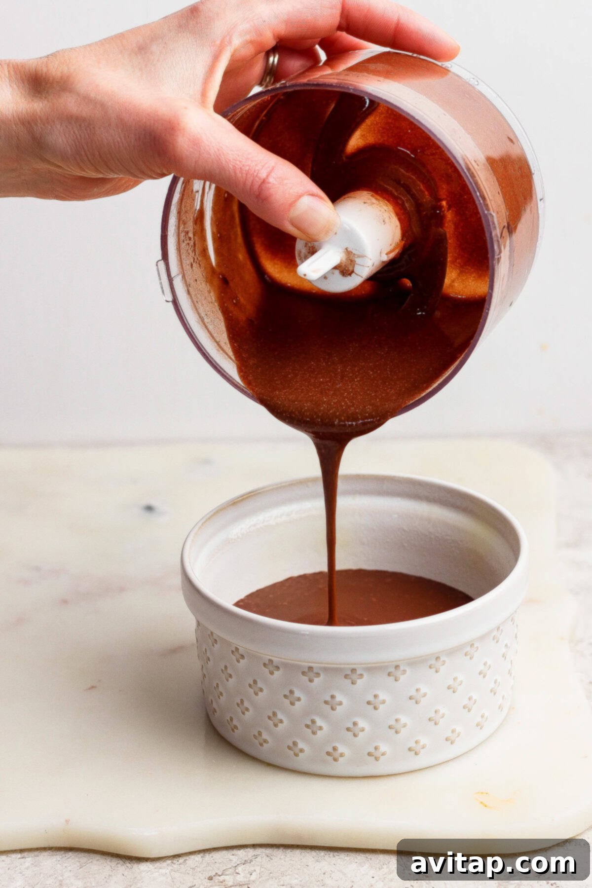 Pouring batter into a ramekin