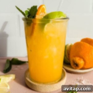 Coconut Citrus: Nature's Energy Boost 4 Close-up of Nature's Gatorade with fresh citrus and mint garnish.