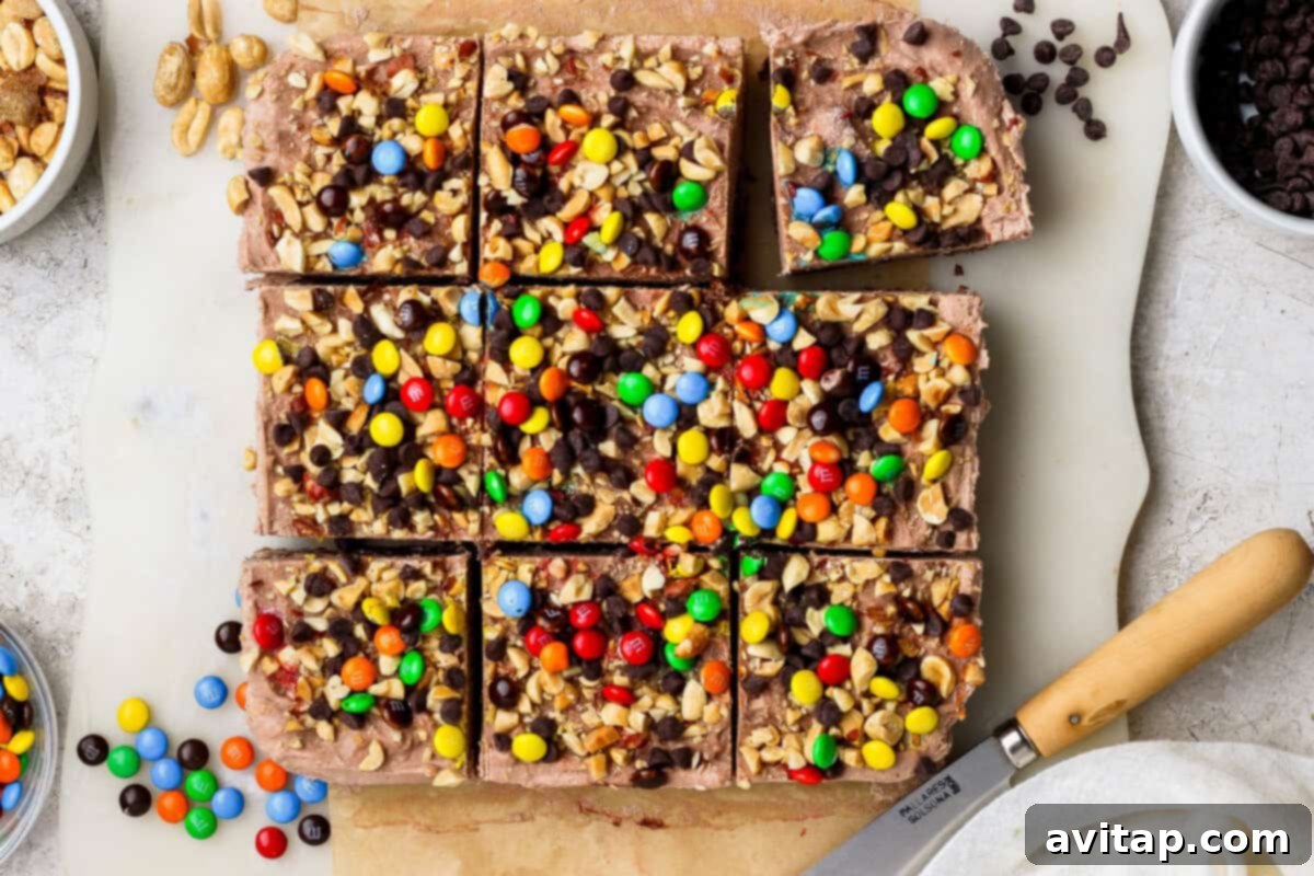 No-Bake Cottage Cheese Dream Bars 2 Delicious cottage cheese cheesecake bars topped with peanuts, chocolate chips, and candy-coated chocolates