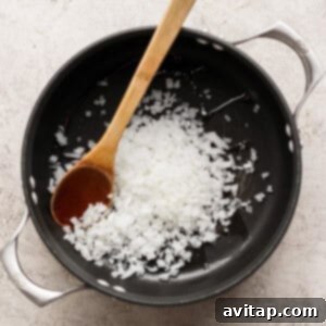 Sautéing onions in a pot.