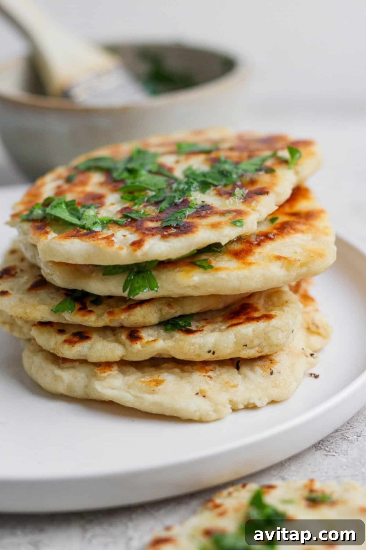Stack of garlic naan bread
