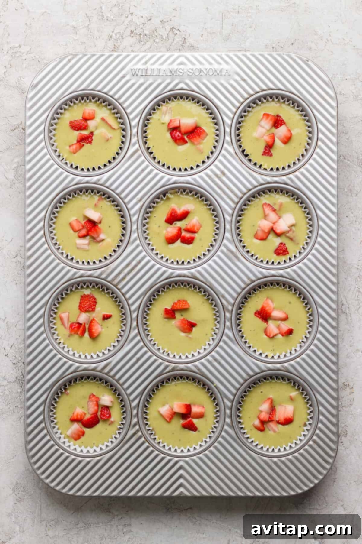 Muffin tin filled with batter