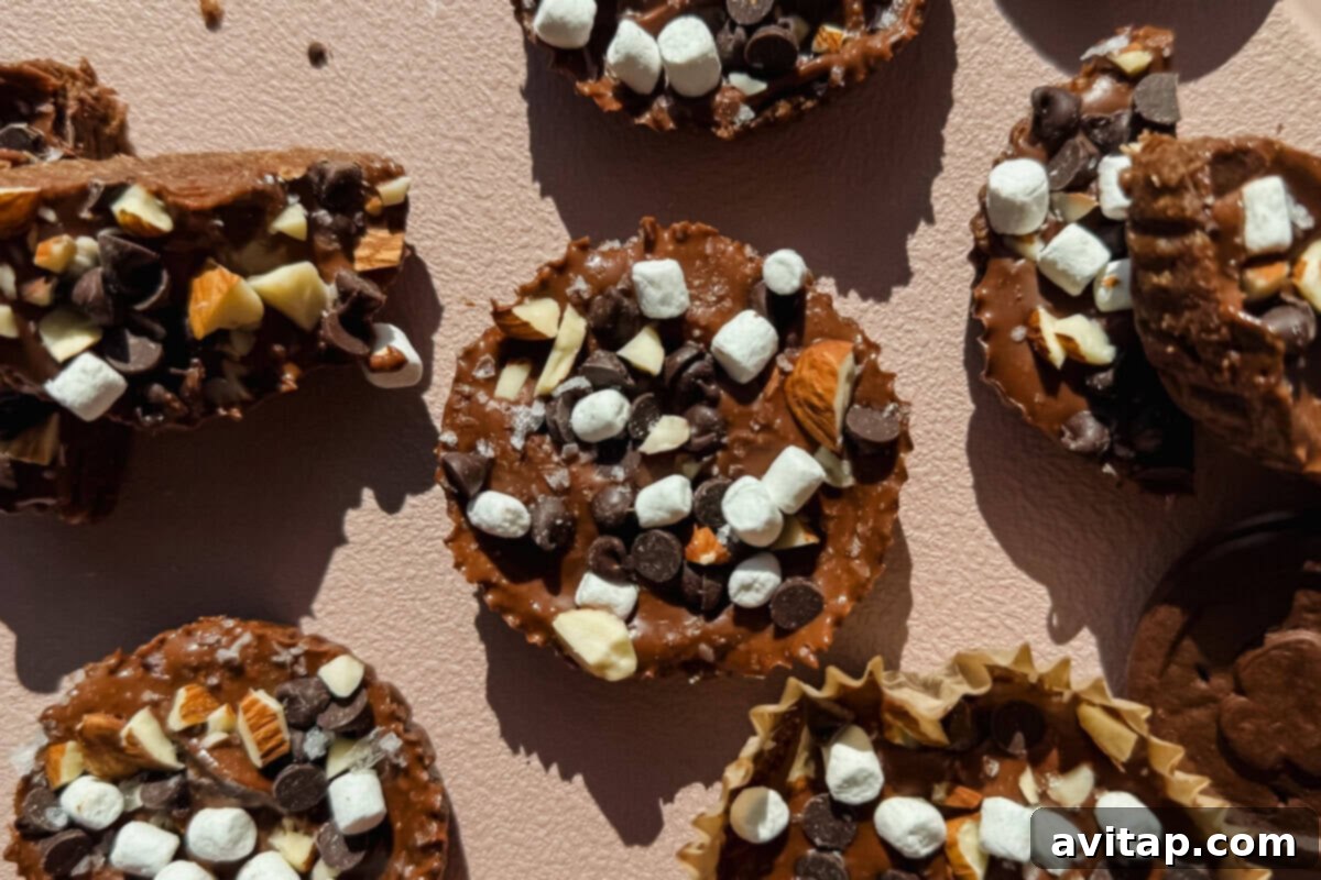 Oatmeal Explorers: Discover Delicious Oat Cups 2 Exploremore Oat Cups with marshmallows, almonds, and chocolate chips