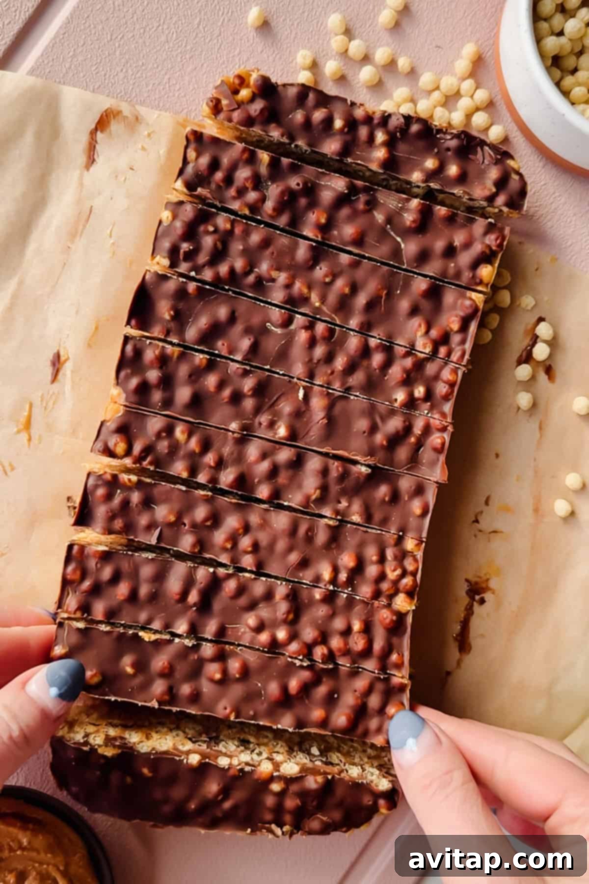 Sliced Peanut Butter Chocolate Puff Bars on parchment paper.