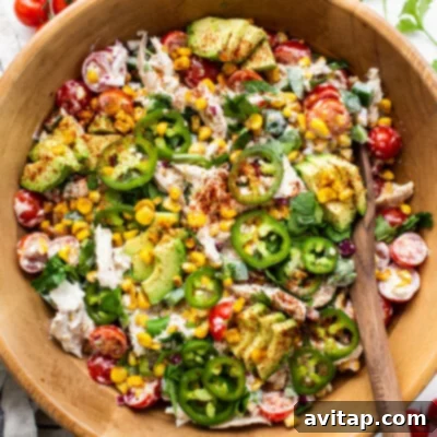 Game Changing Street Corn Recipes 7 A bowl of street corn chicken salad, perfect for sandwiches or a light lunch.