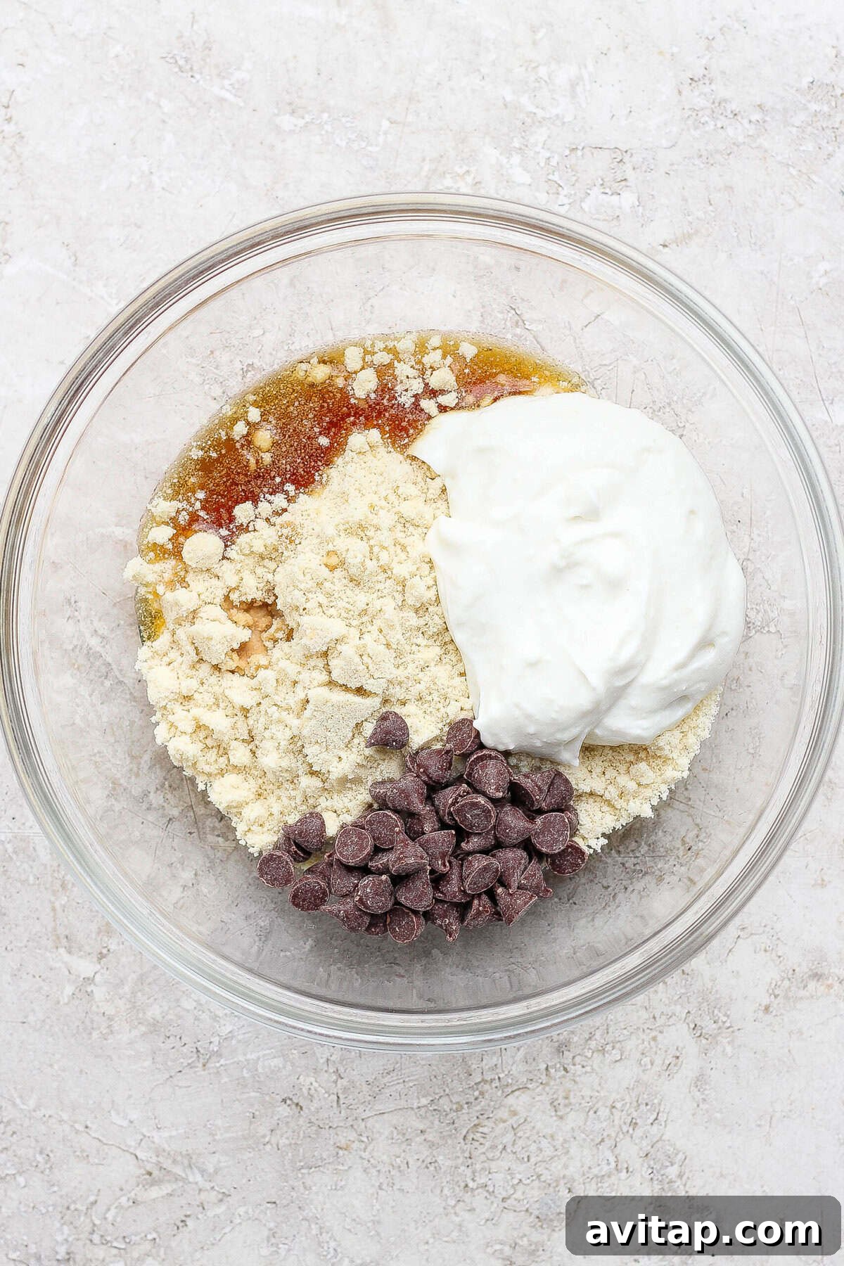 cottage cheese cookie dough ingredients combined in a mixing bowl
