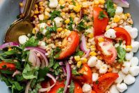 Summer Corn and Tomato Salad with Spicy Chili Crunch Dressing