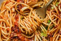 Chili-Crunch Pasta in Smashed Tomato Sauce